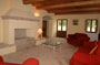Spacious living area with open fireplace