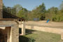 View of children's play area across the meadow